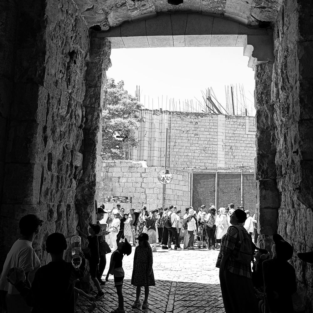 Modern people in an ancient city.