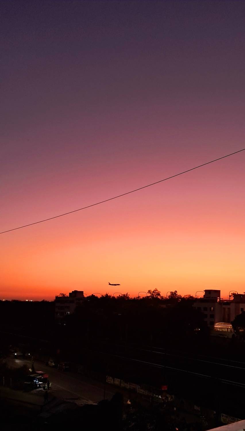 Flight landing with sunset