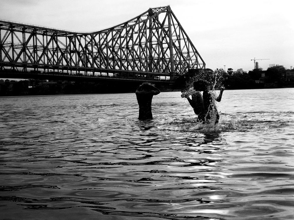 \"Splashes of Joy Beneath the Howrah bridge \"
