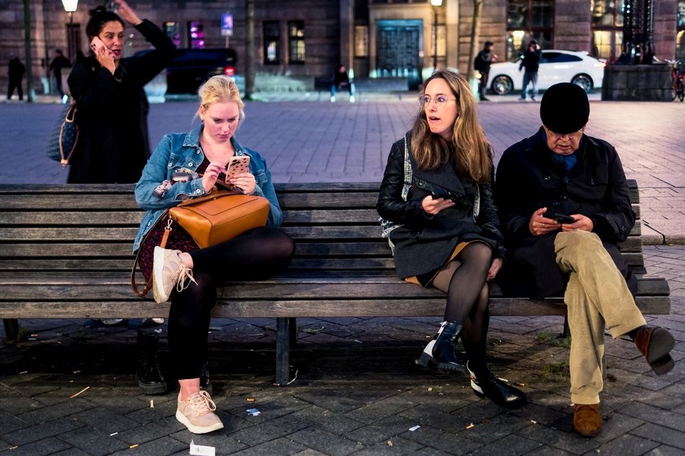 Four Mobile Phone Users