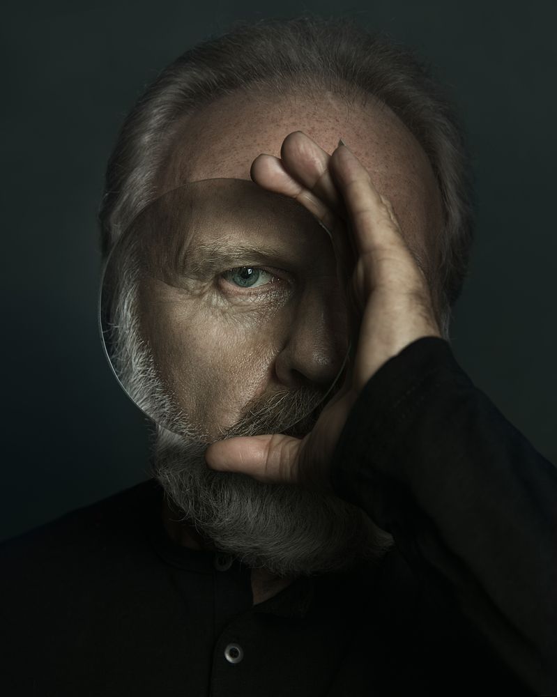 через линзу