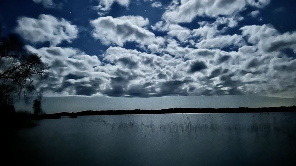 Moonlit Clouds Over Lake Nirzas