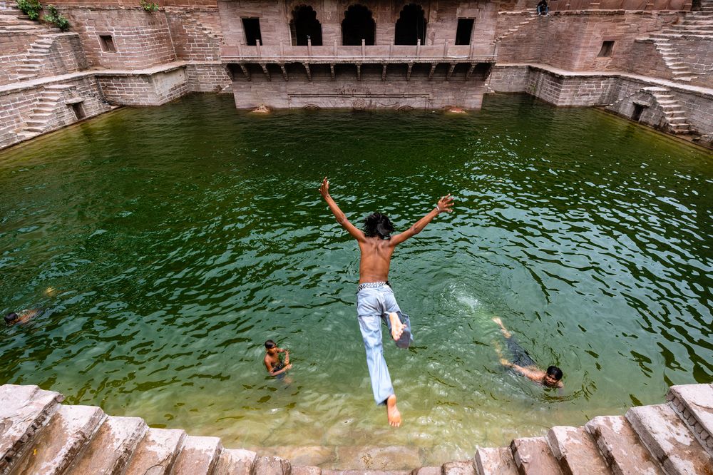 Boy Jumping In Stepwell
