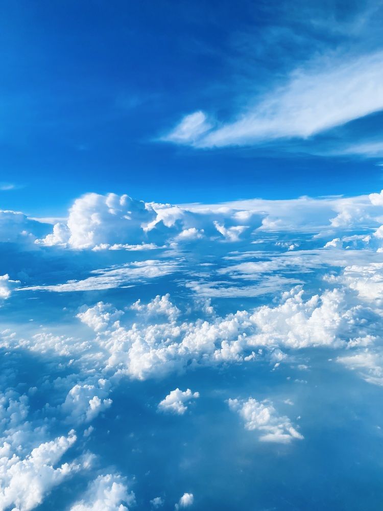 Cloud Waves Chasing the Azure Sky