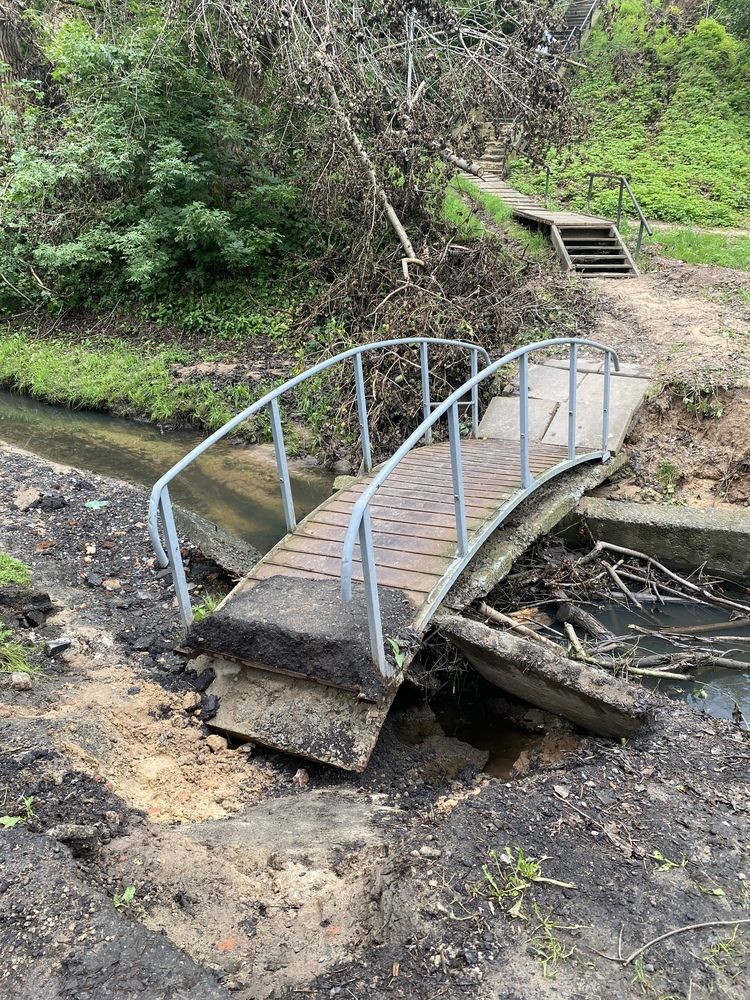 The bridge collapsed due to flooding