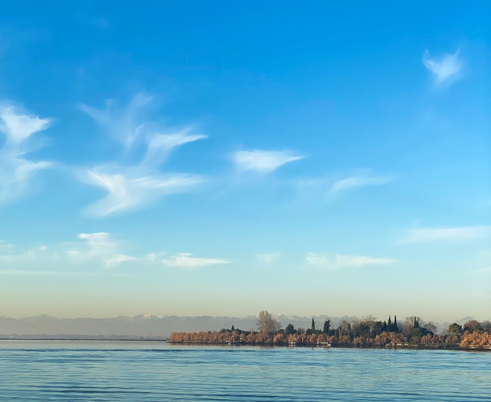 Motley clouds in the blue sky