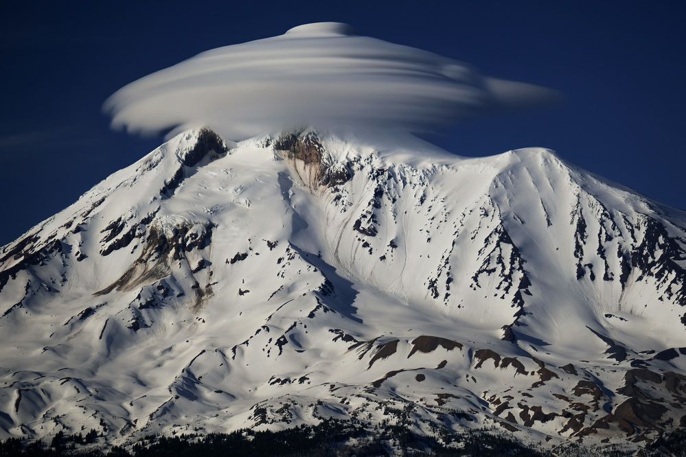 Lenticular clouds over dormant volcano