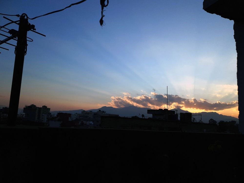 \"Kathmandu evenings: where sunsets whisper and the city listens.