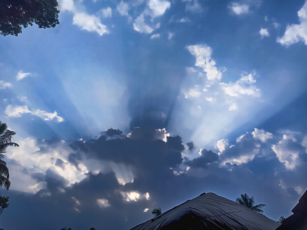 Sun rays passing through clouds