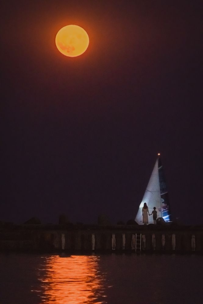 Sailing under the moon light
