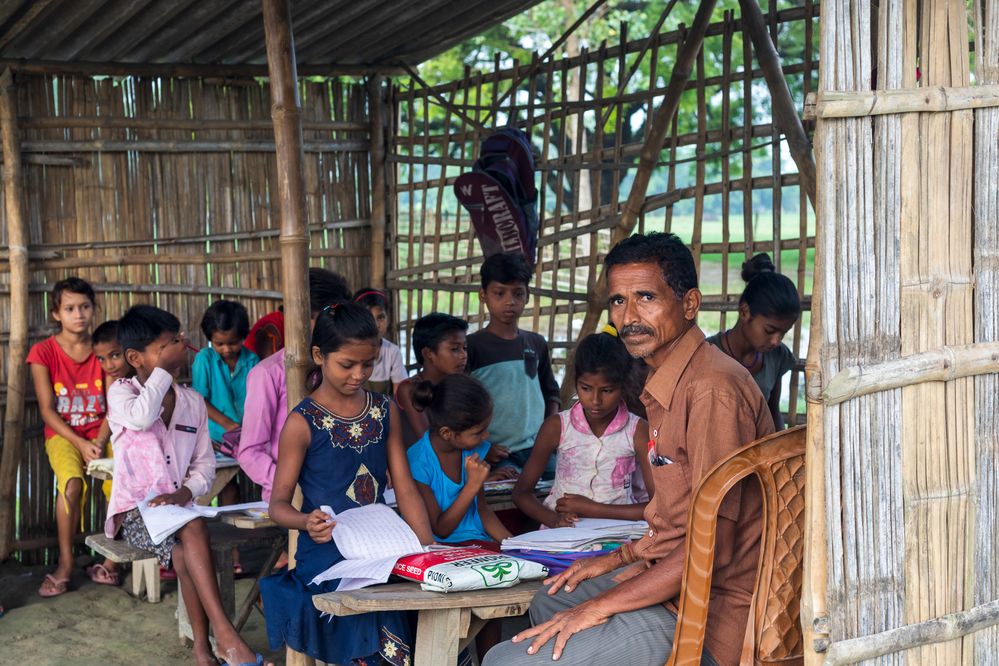 School children and their favourite teacher