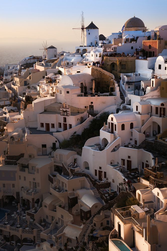 Sunset glow over Oia windmils