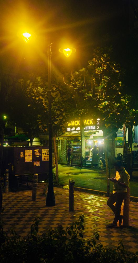 Under the street light glow