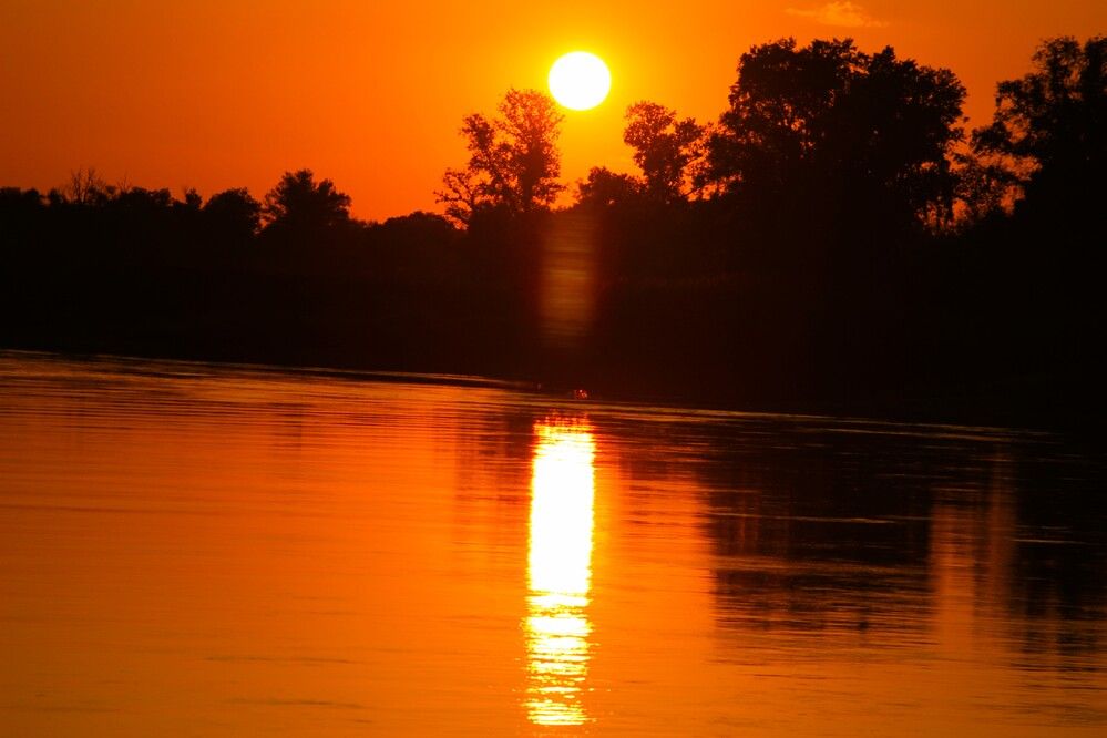“Fire Over the Still Waters”