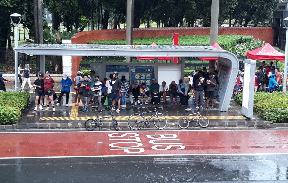 Several people took shelter from the rain.