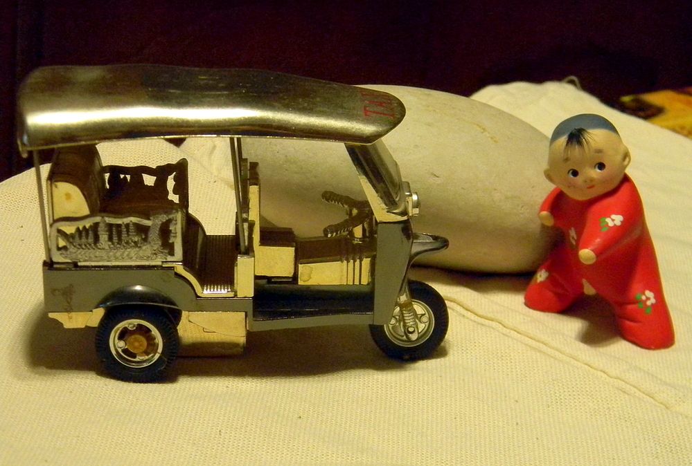 Водитель тук-тук