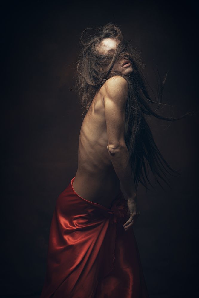 Female in red skirt