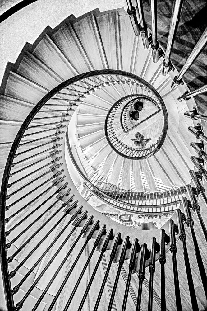 Вниз по лестнице.