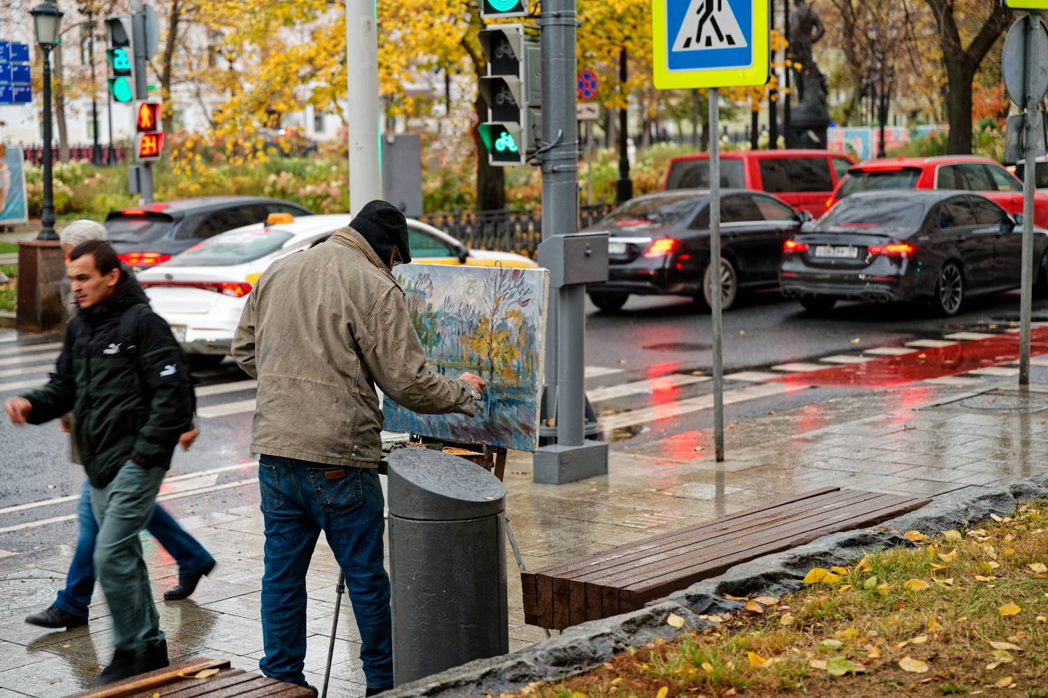 Уличный живописец Уличный живописец
