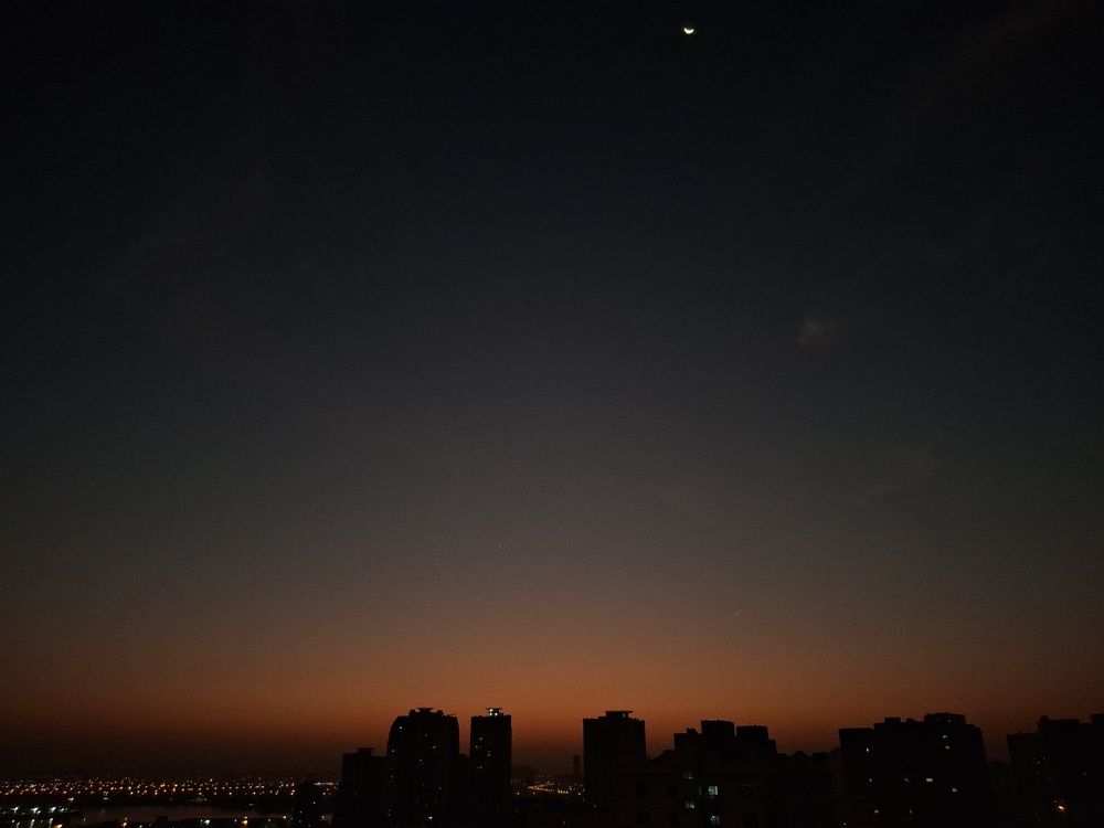 Sunset with Half Moon