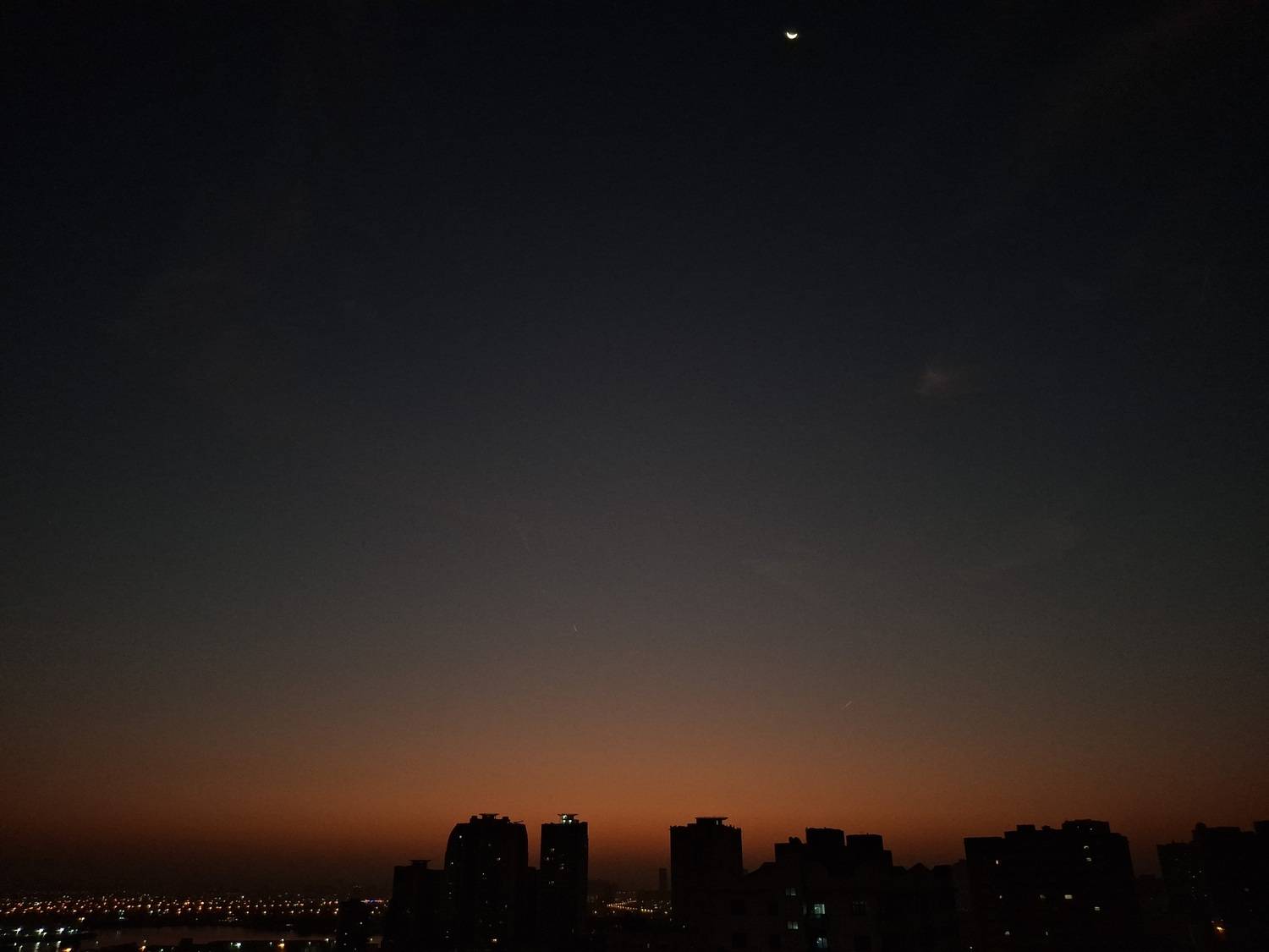 Sunset with Half Moon