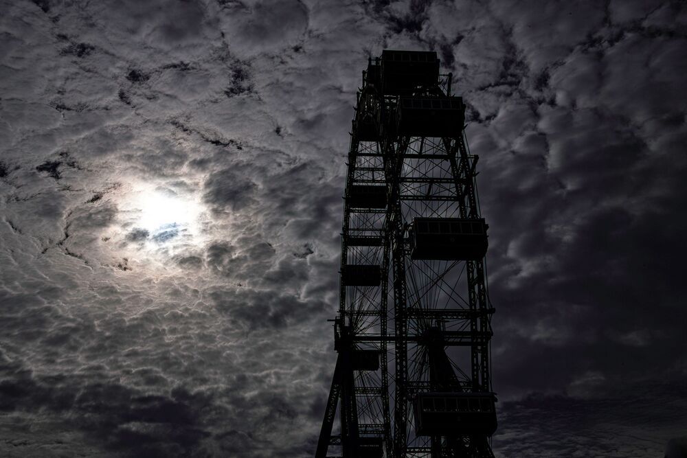 Ferris wheel in silhouette