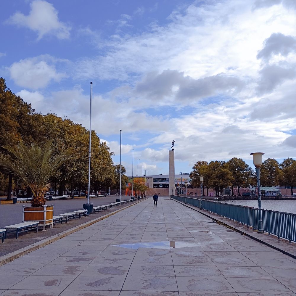 Urban perspective and blue and white sky