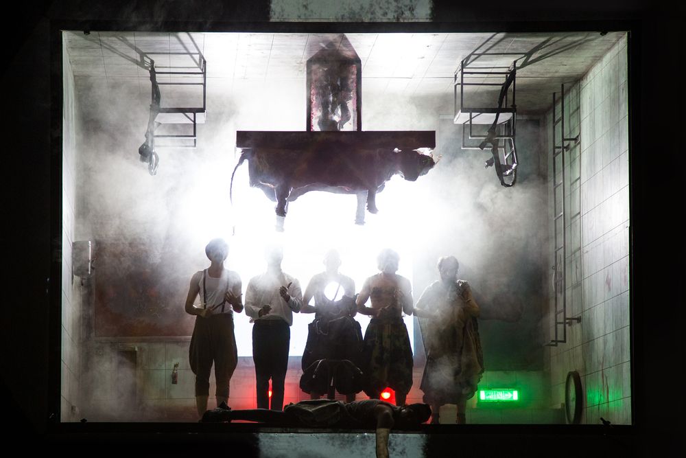 A scene from the play knocks him to the ground