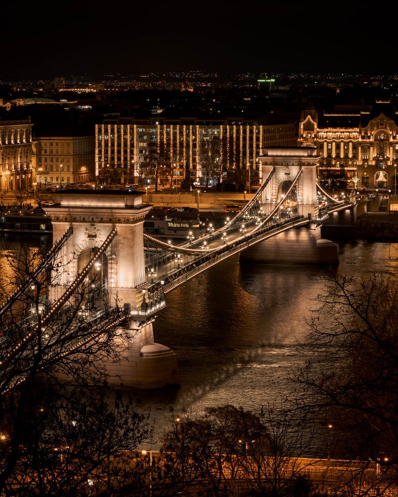 Illuminated Szechenyi Chain Bridge over Danube in Budapest at night
