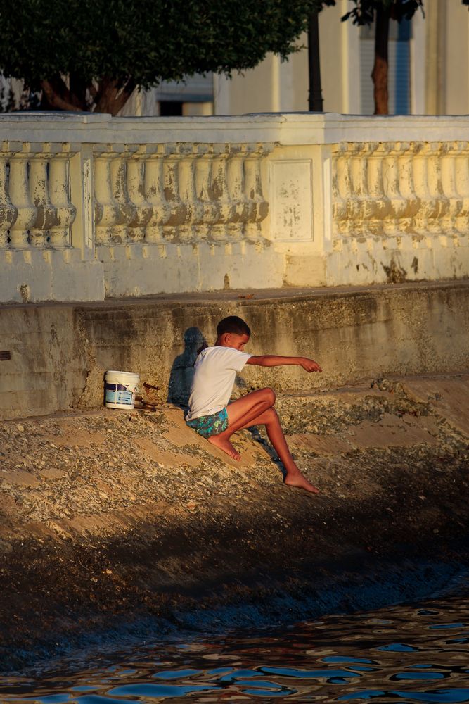 Boy Fishing Alone