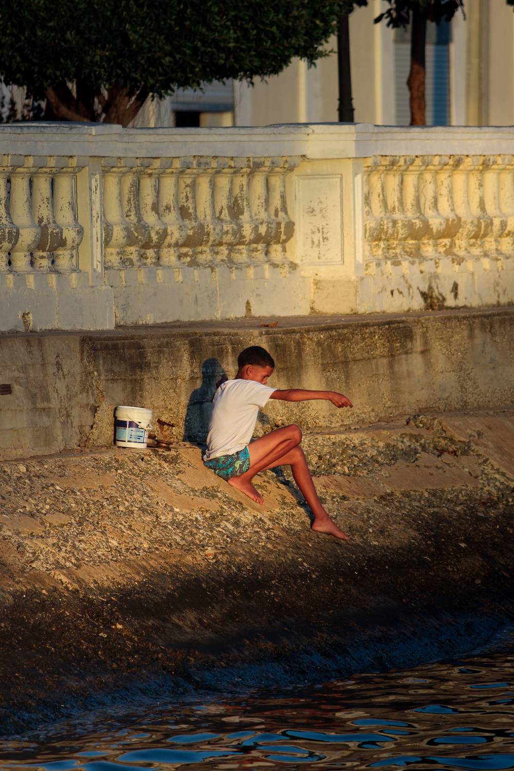 Boy Fishing Alone