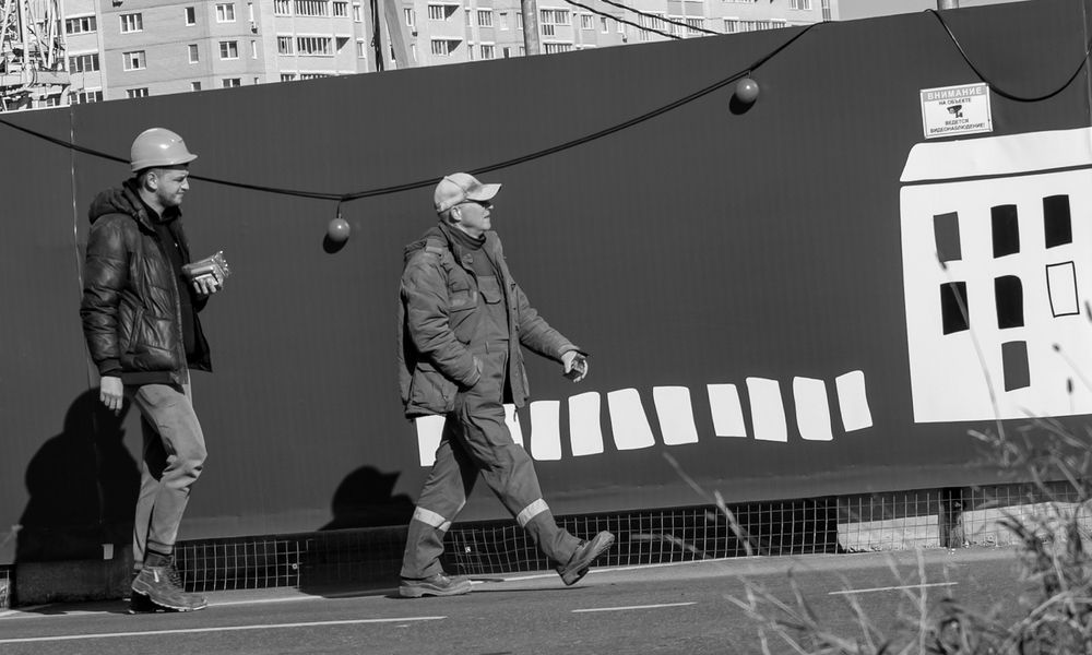 В Новый город.