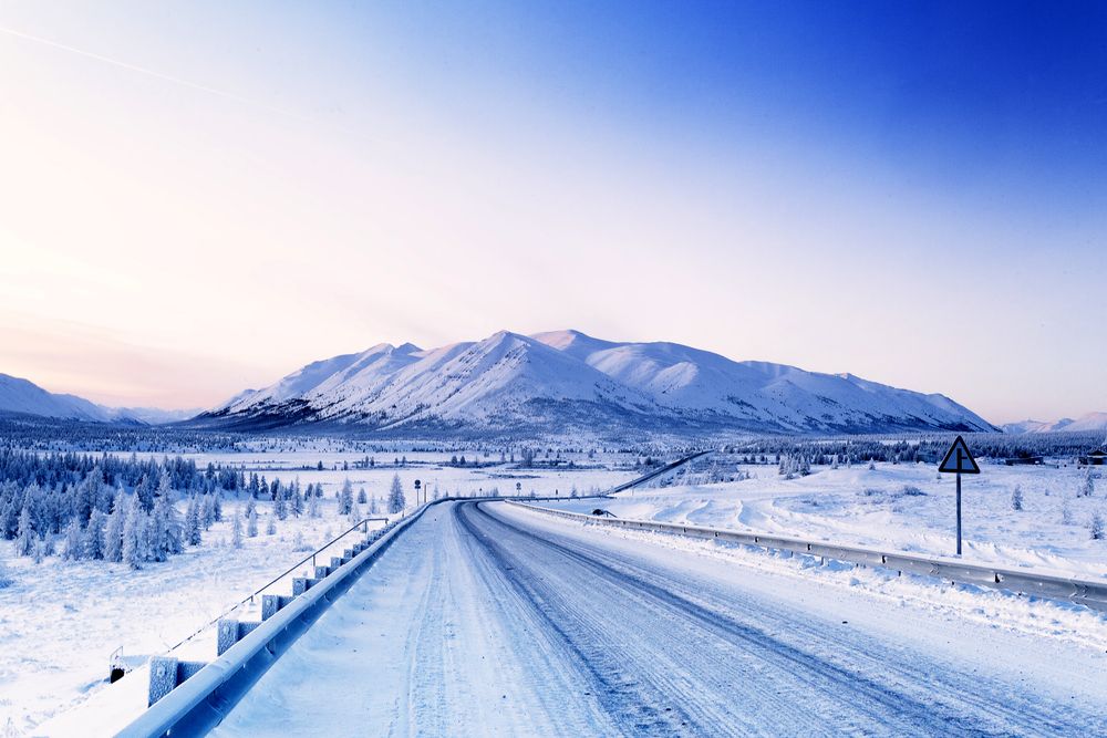 По  Колымской трассе.