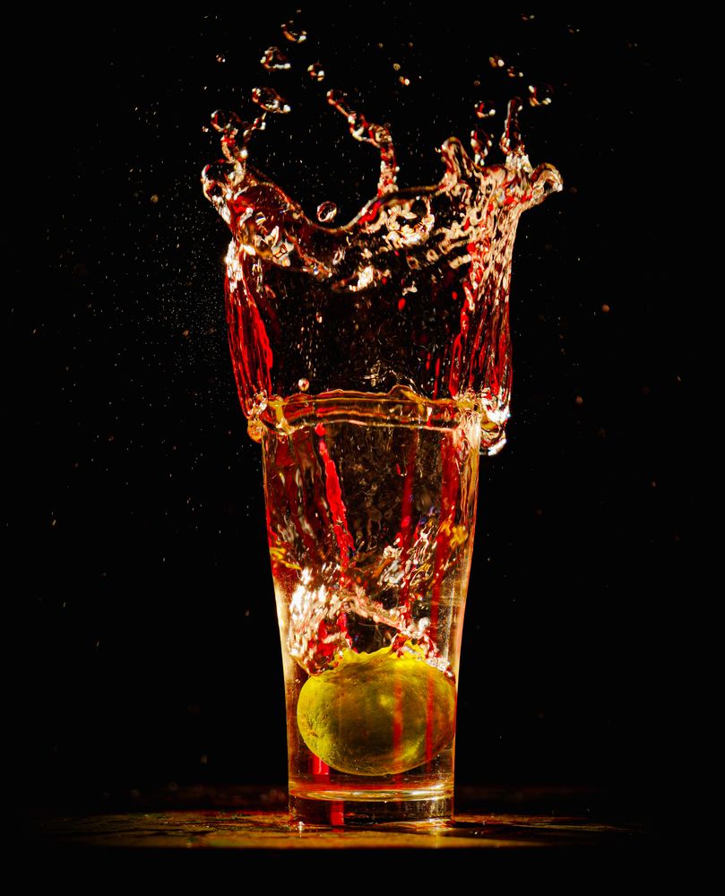 a lemon in a glass of water
