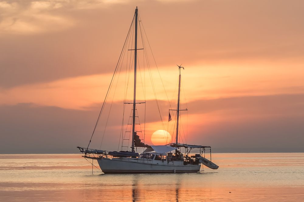 Sailboat With Beautiful Sunrise