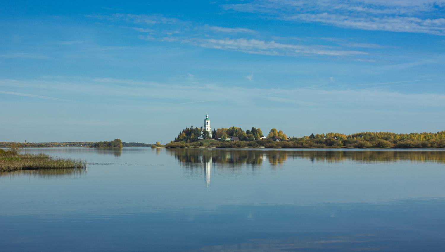 The Church of St. Athanasius the Great on the banks of the Kubena River on a clear autumn day