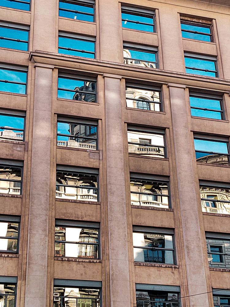 Reflections of a City Watching Itself