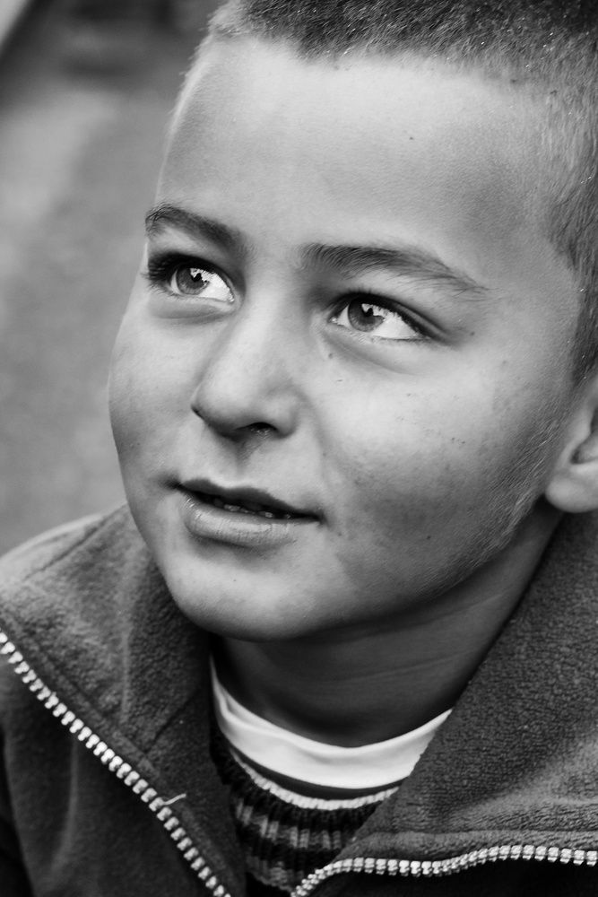 Black and white portrait of a young boy