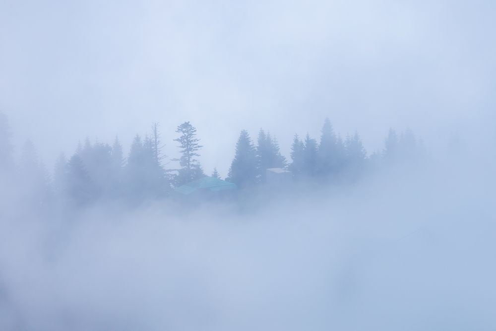 Landscapes veiled in fog of a Georgian mountain village