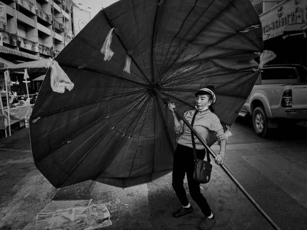 Under the weight of the parasol