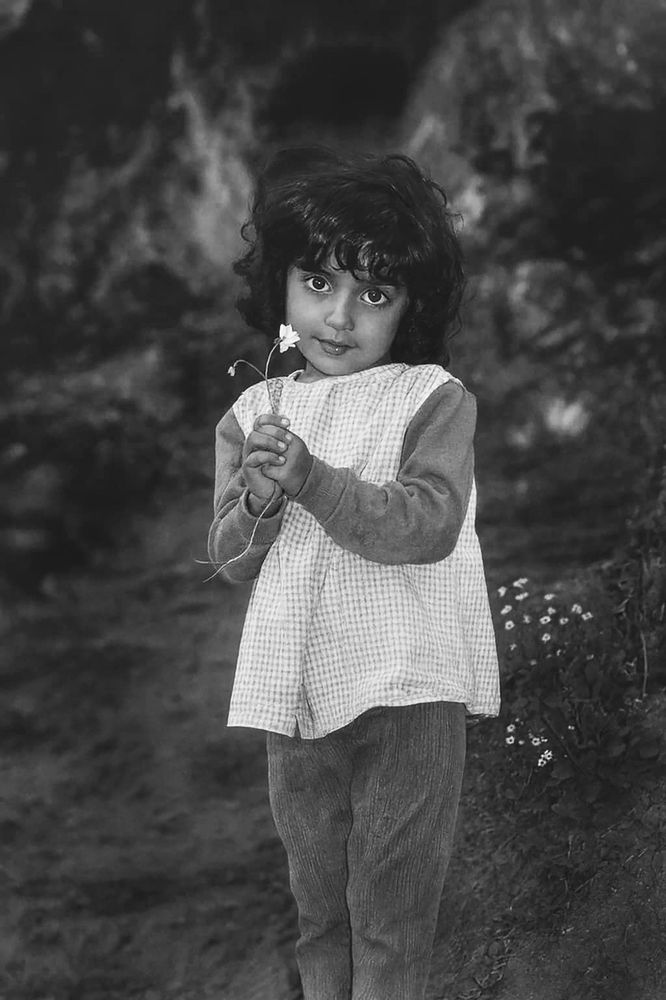 A girl with white flower