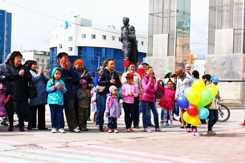 Возле памятника.