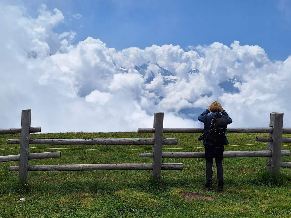 Swiss landscape with white summer clouds.