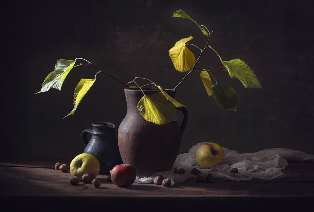 Still life with autumn apples and nuts