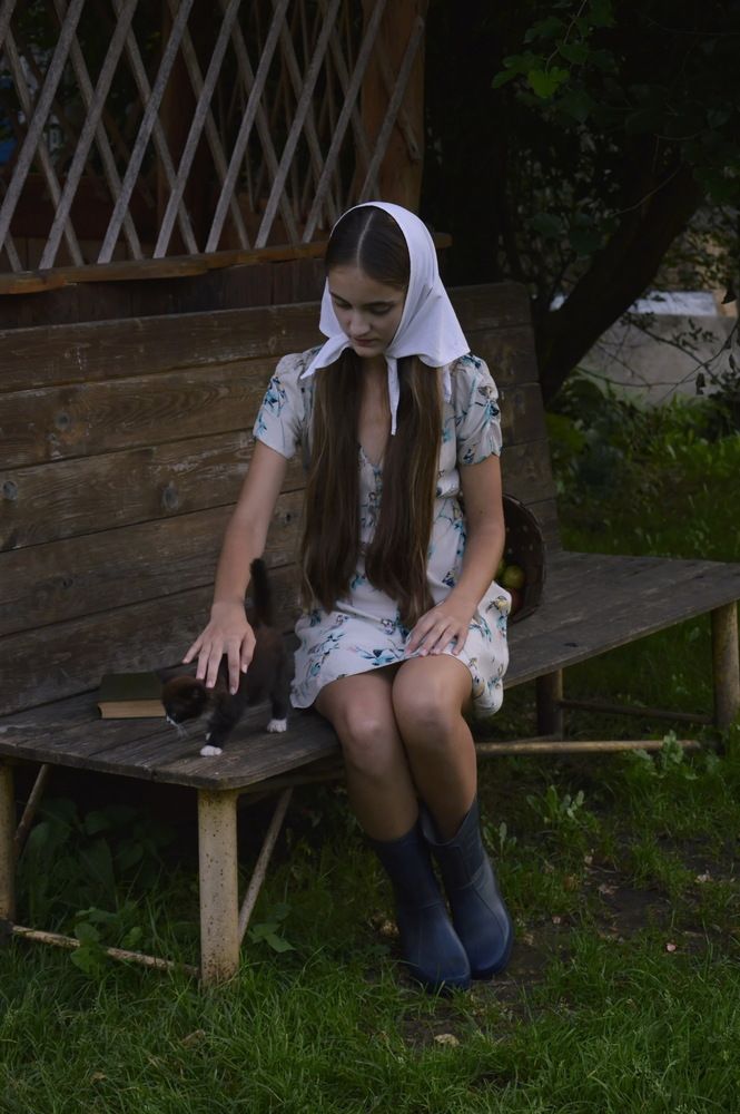 Village girl and cat