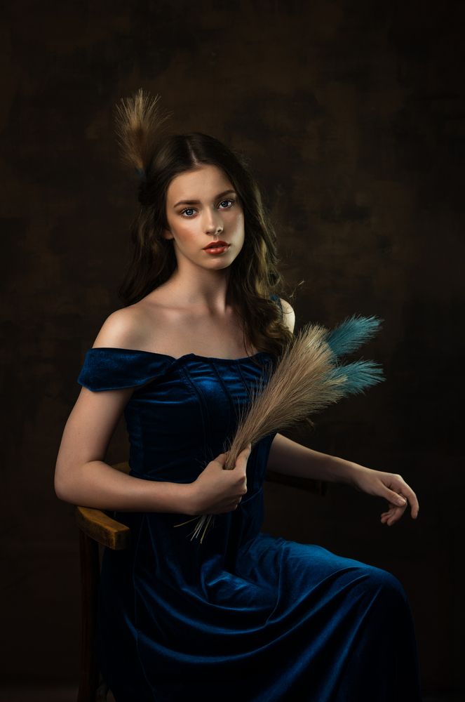 The girl in the blue dress