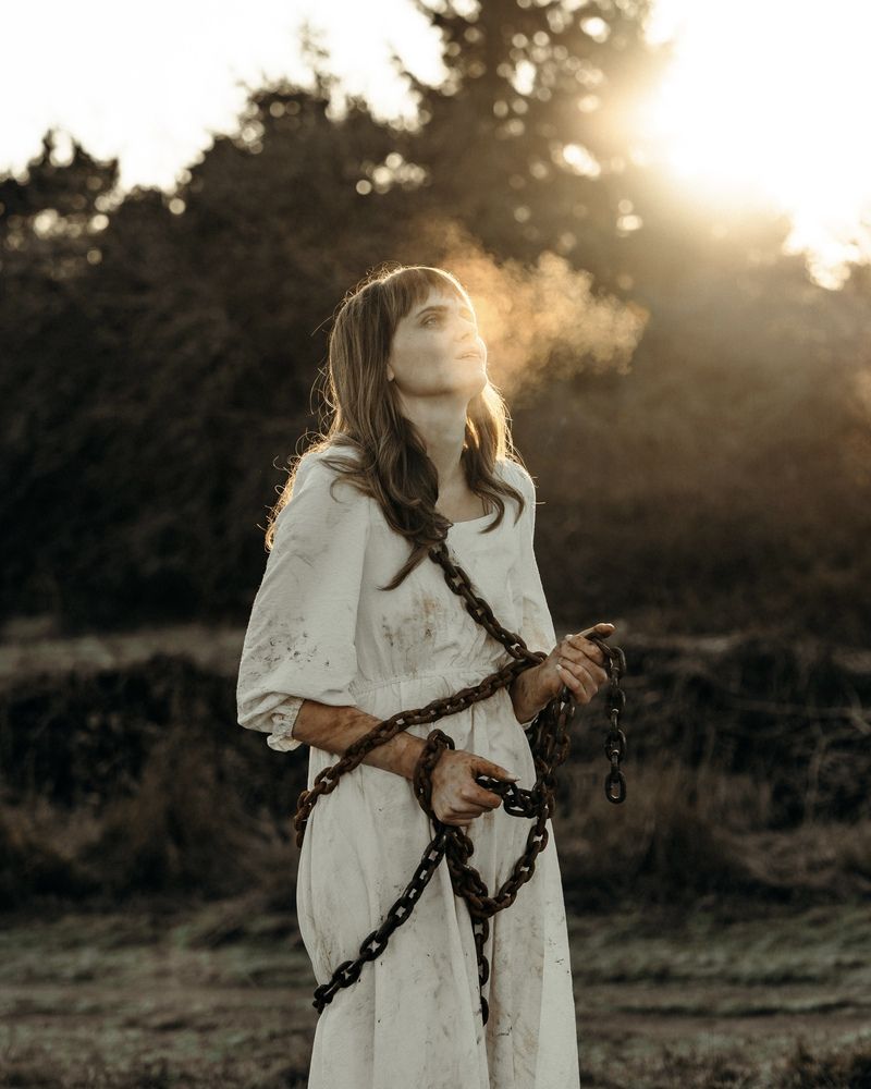 Between captivity and faith.