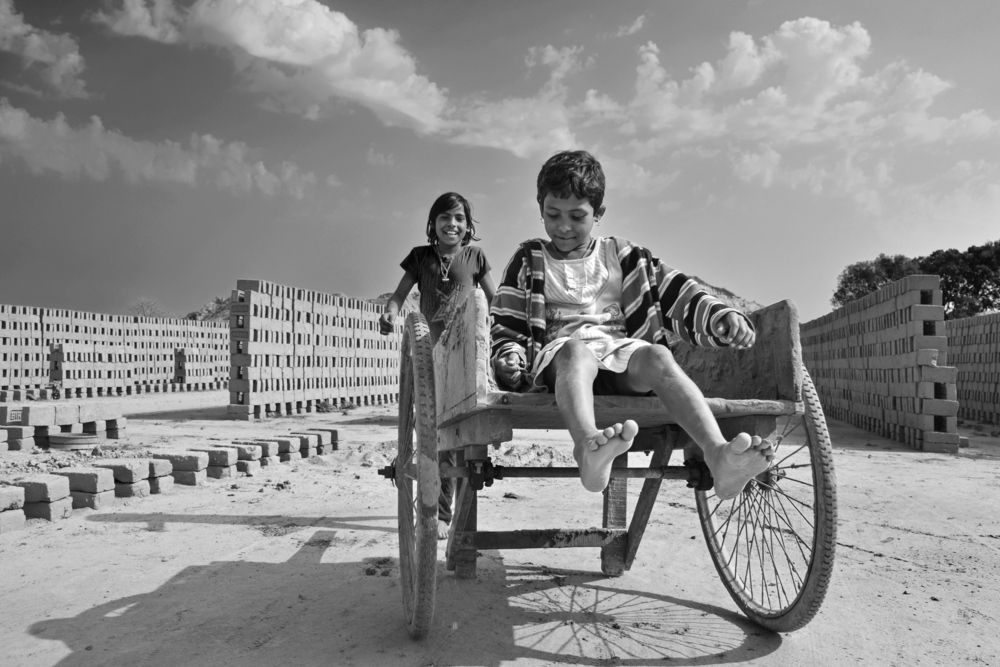 Two Children Playing in the Brick Fields