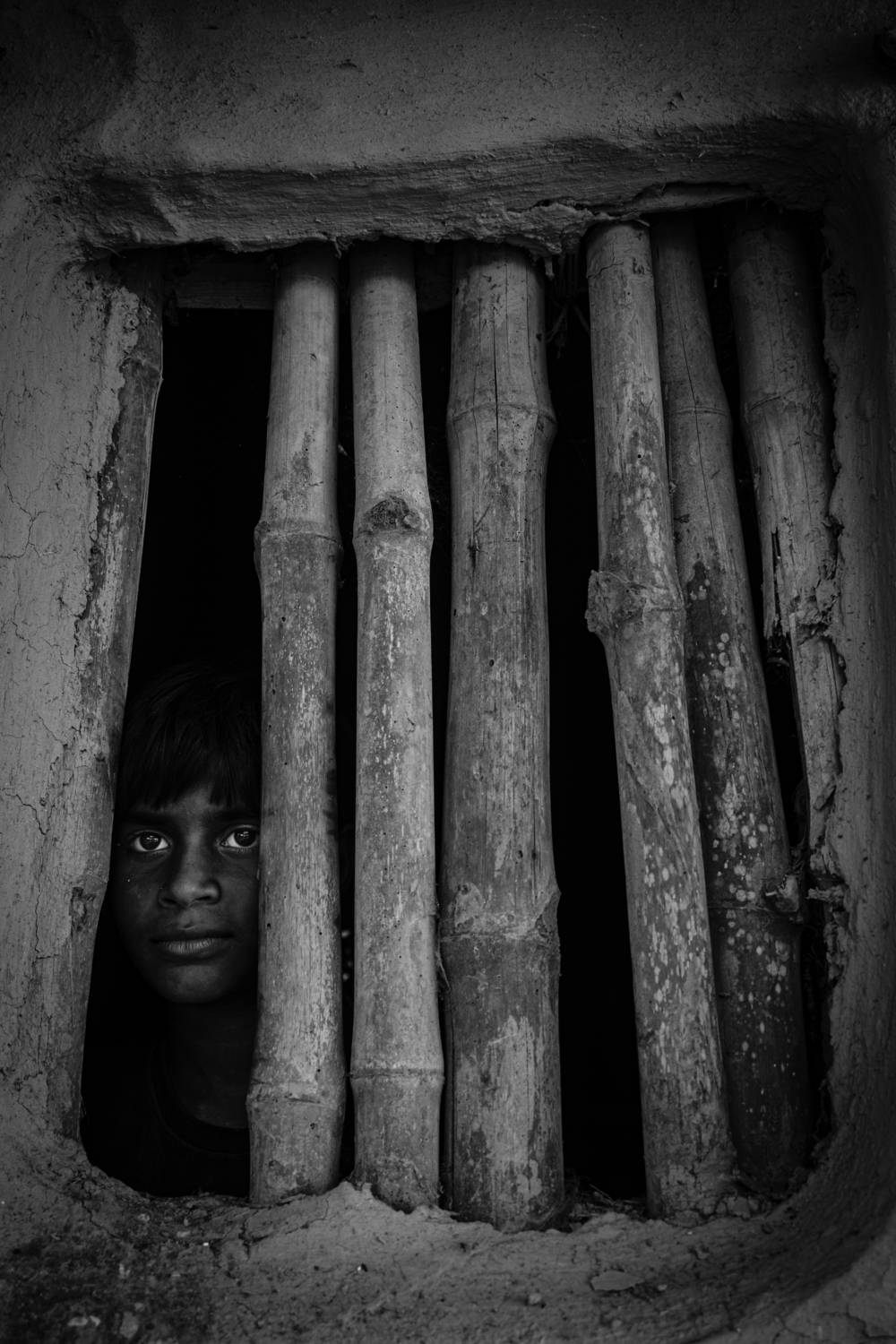 “Behind Silent Bars”