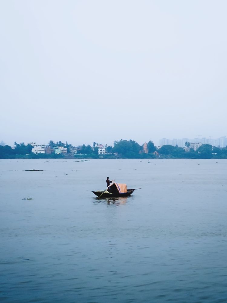 Solitary Voyage on the Misty River